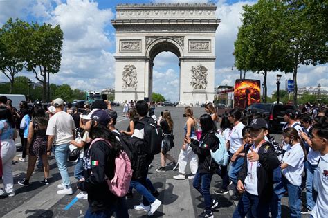 French government paints a rosy picture for tourism despite unrest over the police killing of a teen